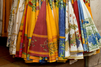 Photo of colorful tablecloths in Provence, France